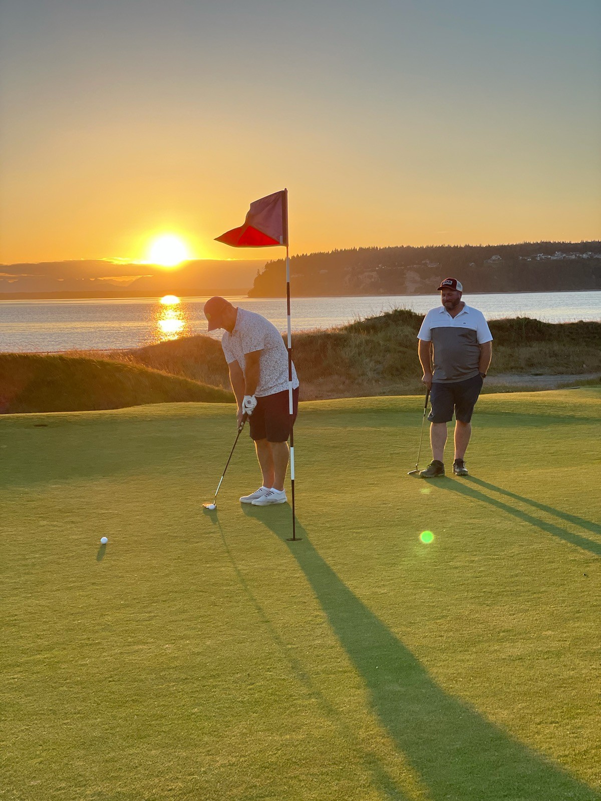 Ryan Jack golfs with a friend