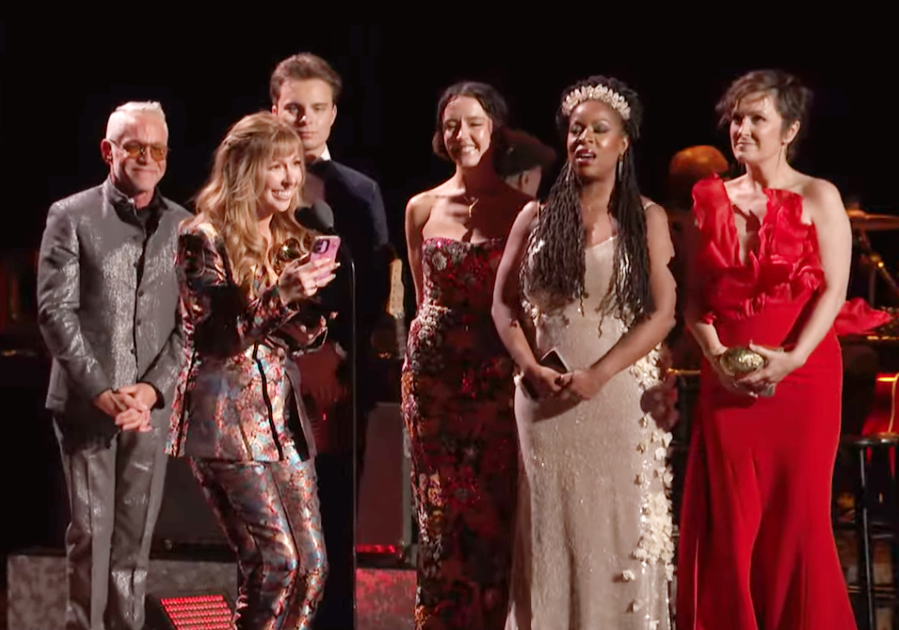 The members of saje accept their 2026 Grammy Award