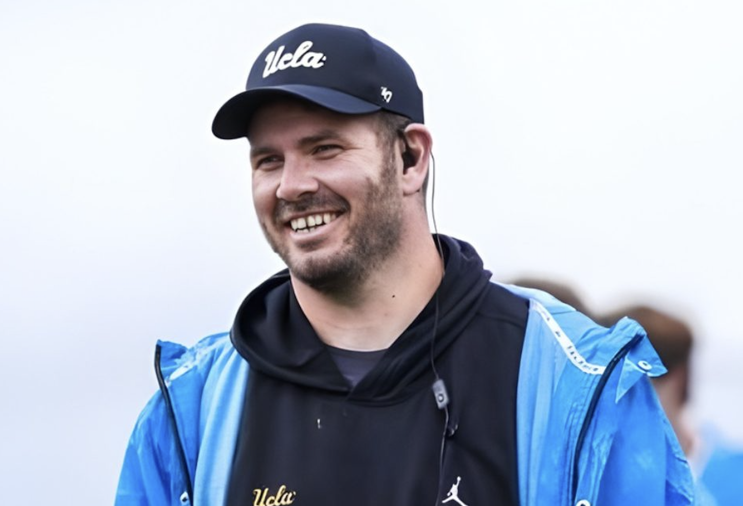 Former CWU rugby coach in a UCLA jacket and hat