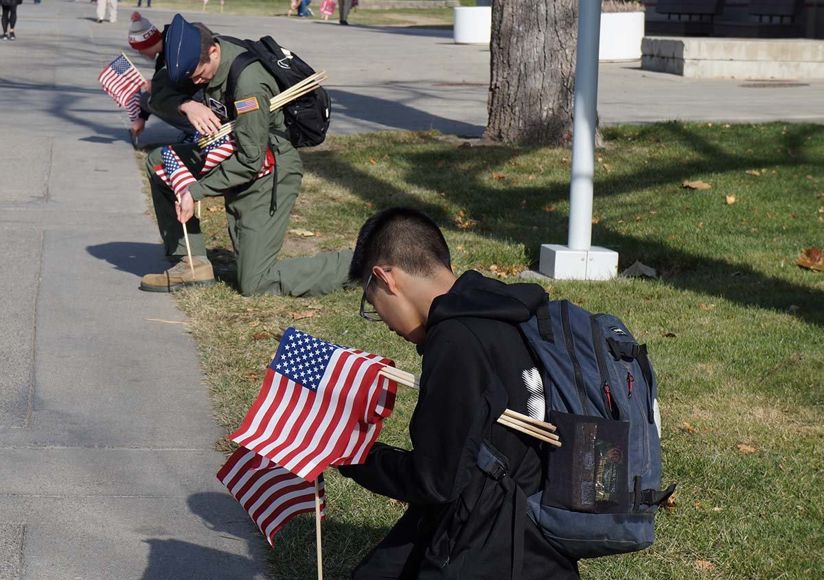 CWU students place flags on the Walnut Mall in 2021
