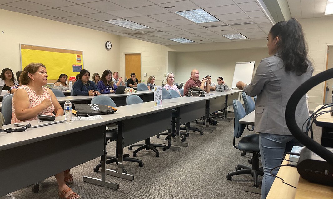 North Central Washington EOC Director Maria Morales talks to a group of community members last fall.