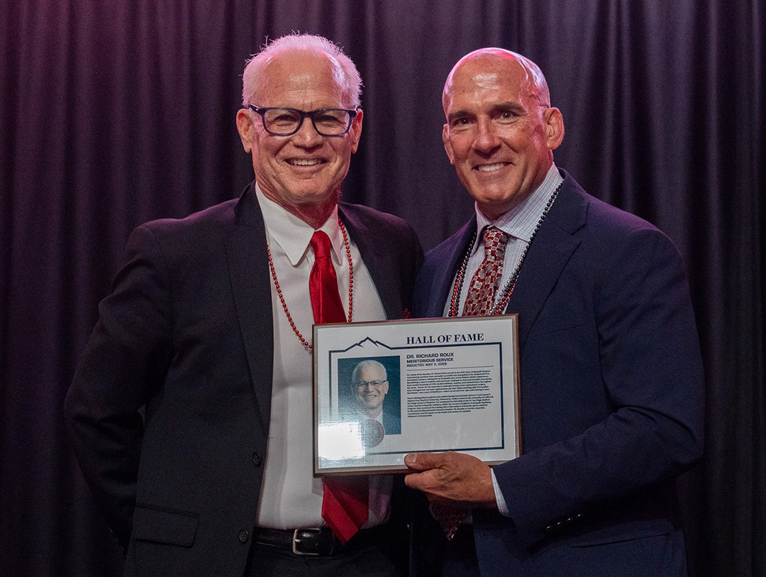 Dr. Richard Roux with Athletic Director Dennis Francois