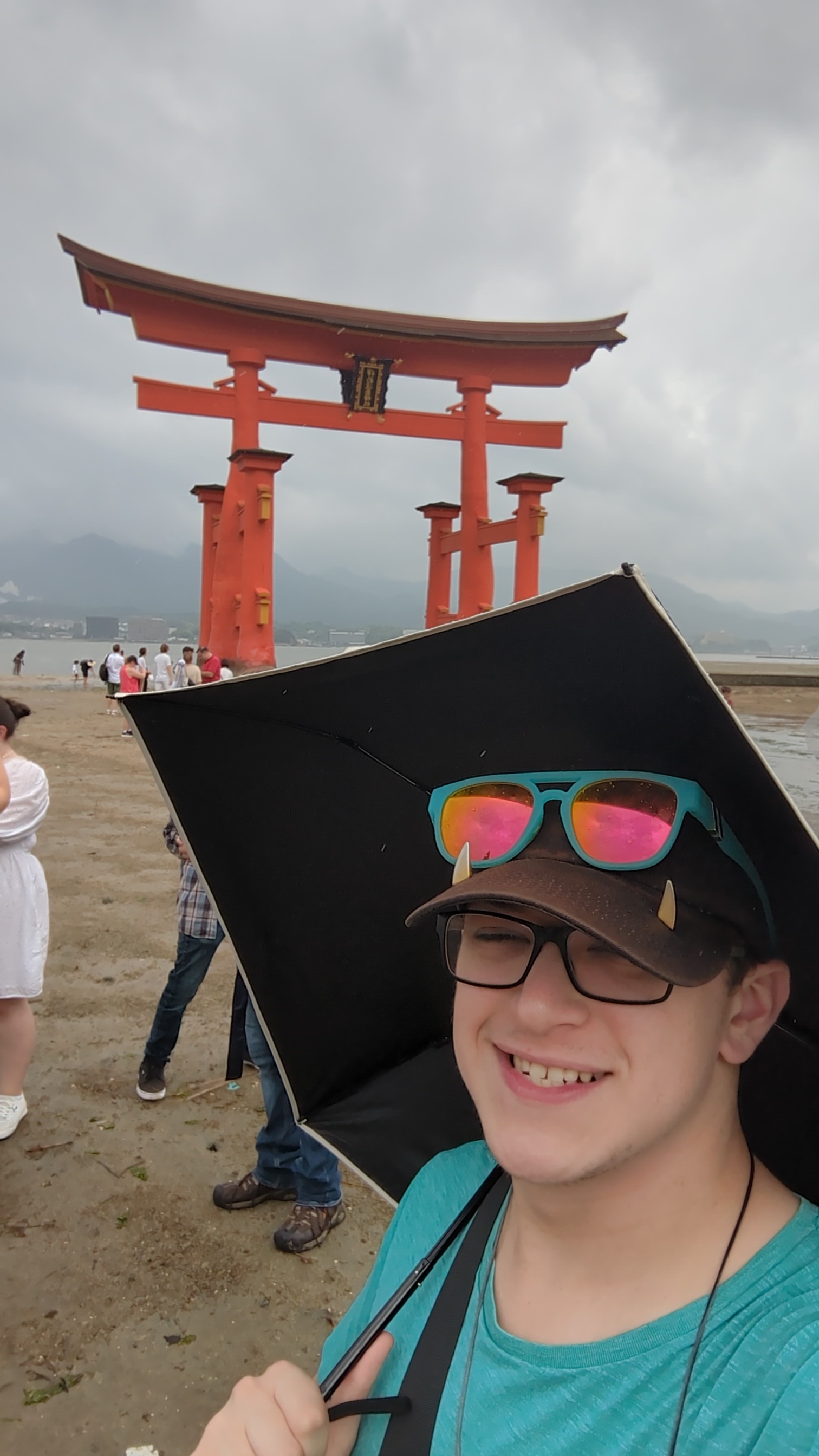 Wyatt Dean in front of a Japanese arch