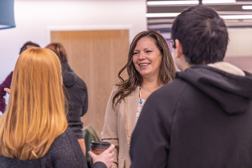 Zoe Higheagle Strong talks with guests at the February 19 open house in the MCC.