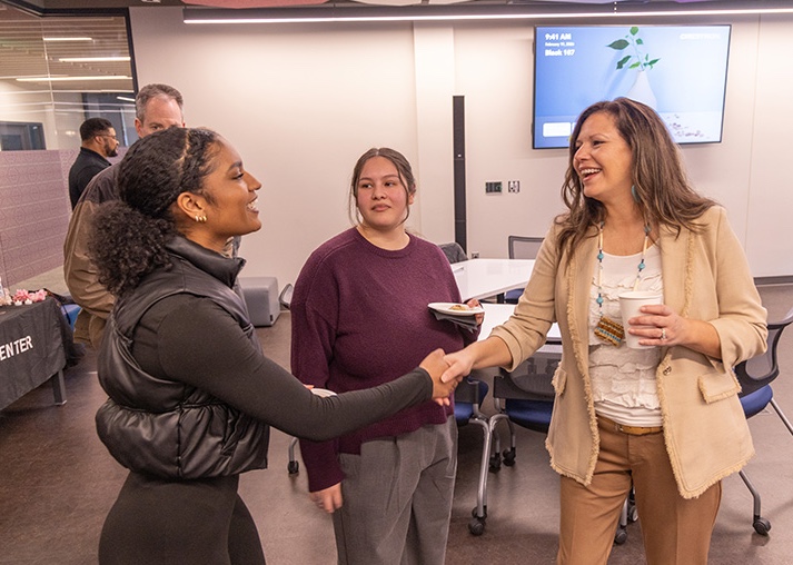 Zoe Higheagle Strong talks with guests at the February 19 open house in the MCC.