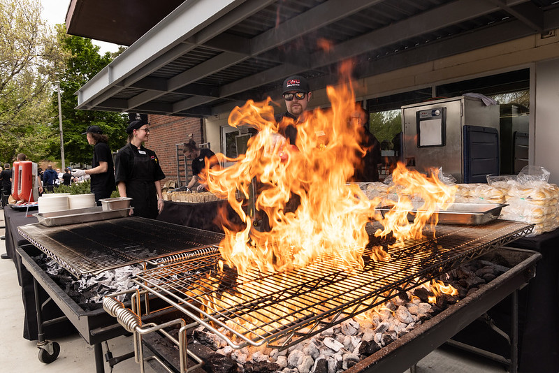 employee grilling burgers