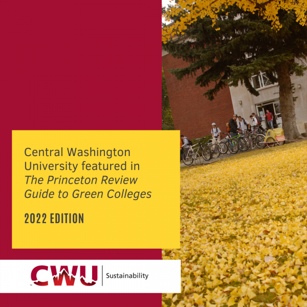 A group of people outside of a hall near bikes