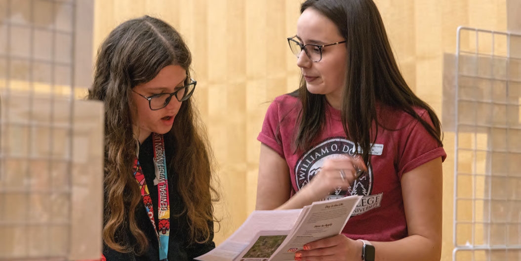 Students reviewing a document
