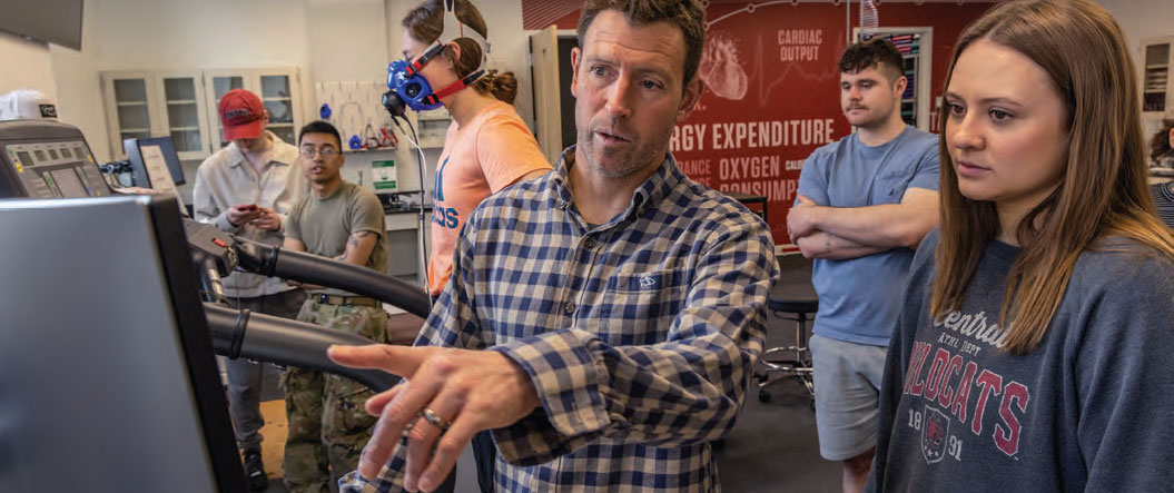 Professor instructing their students