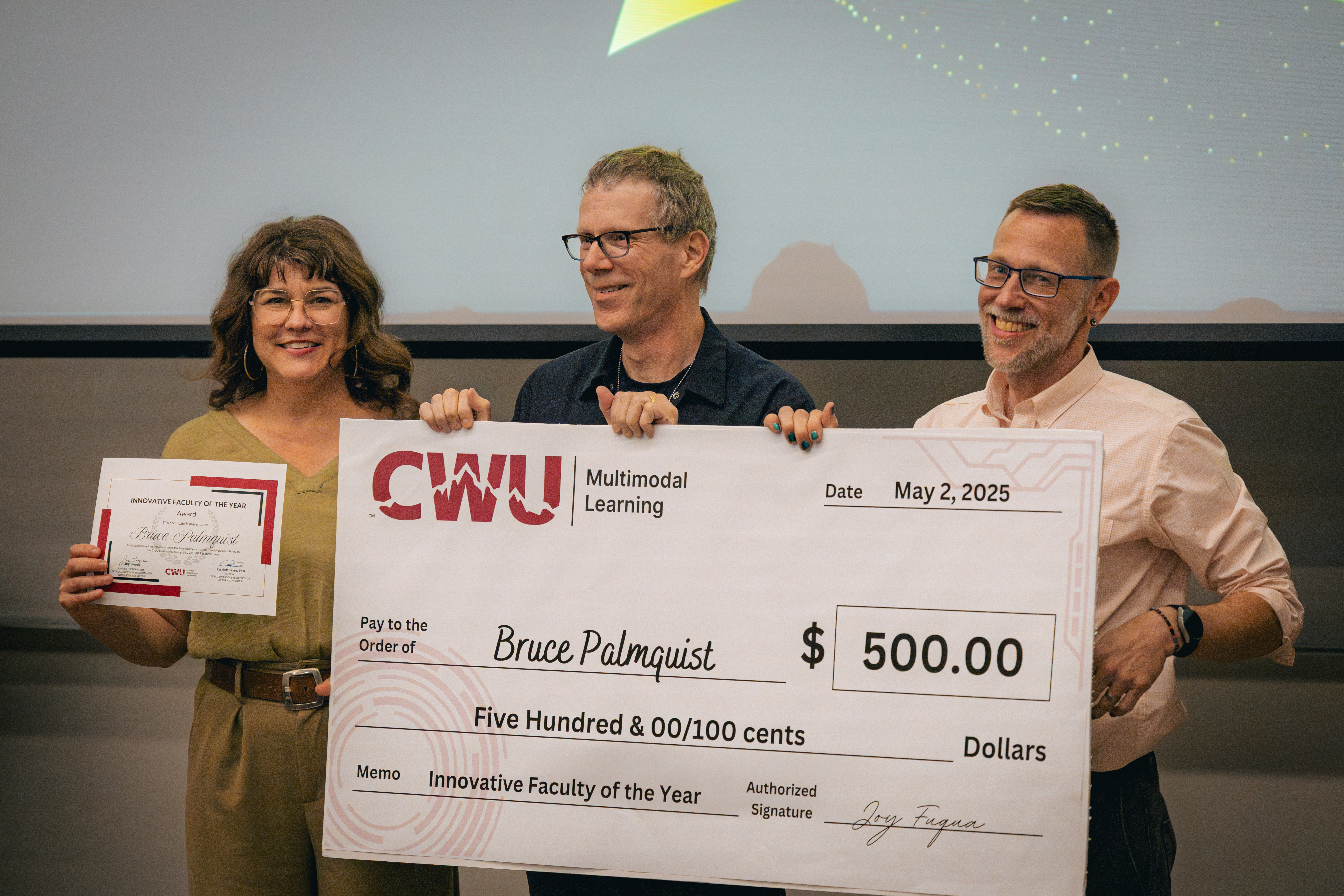 Palmquist accepting Faculty Innovator of the Year award 2025