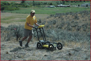 Dr. Brian Whiting operating GPR unit on site