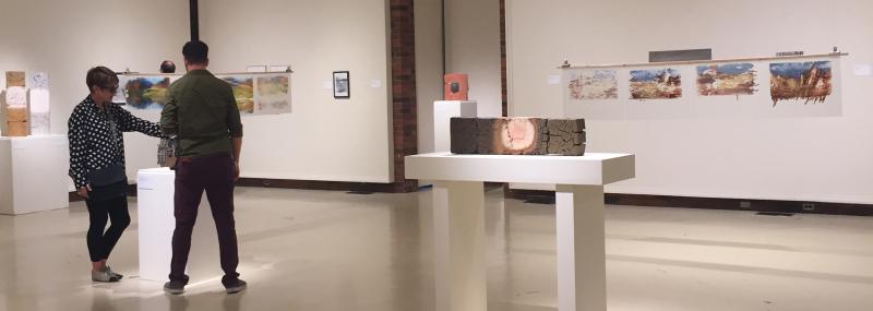 students looking at the new art exhibit