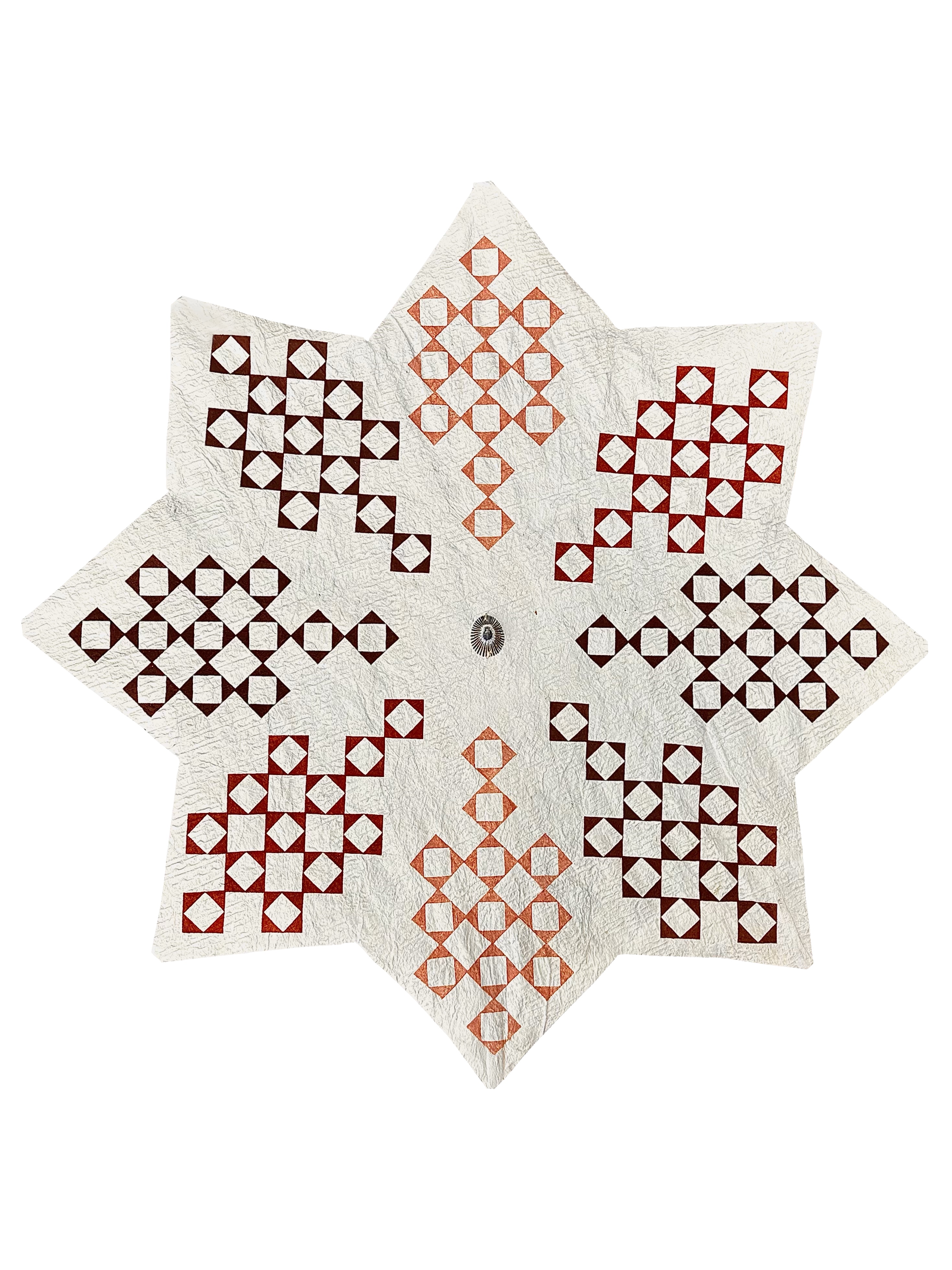 Quilt star-patterned shape kapa textile made from the beaten bark of the paper mulberry tree.
