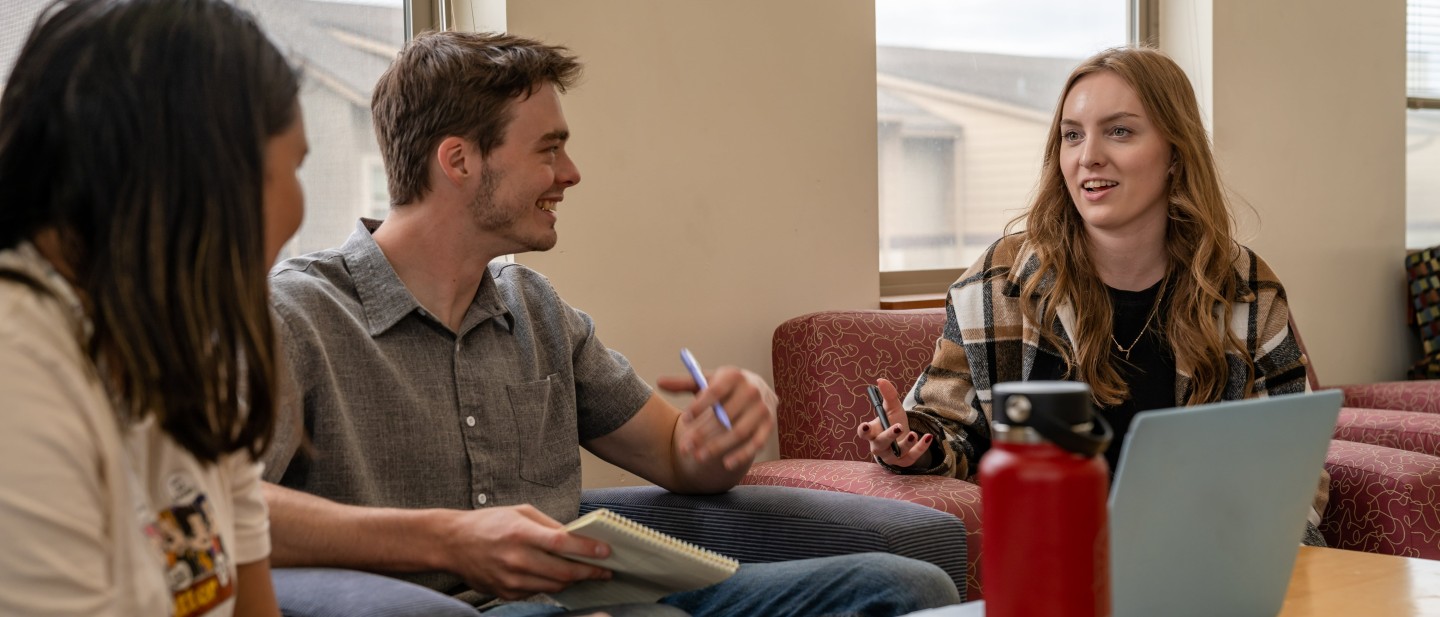Students talking in a study group setting
