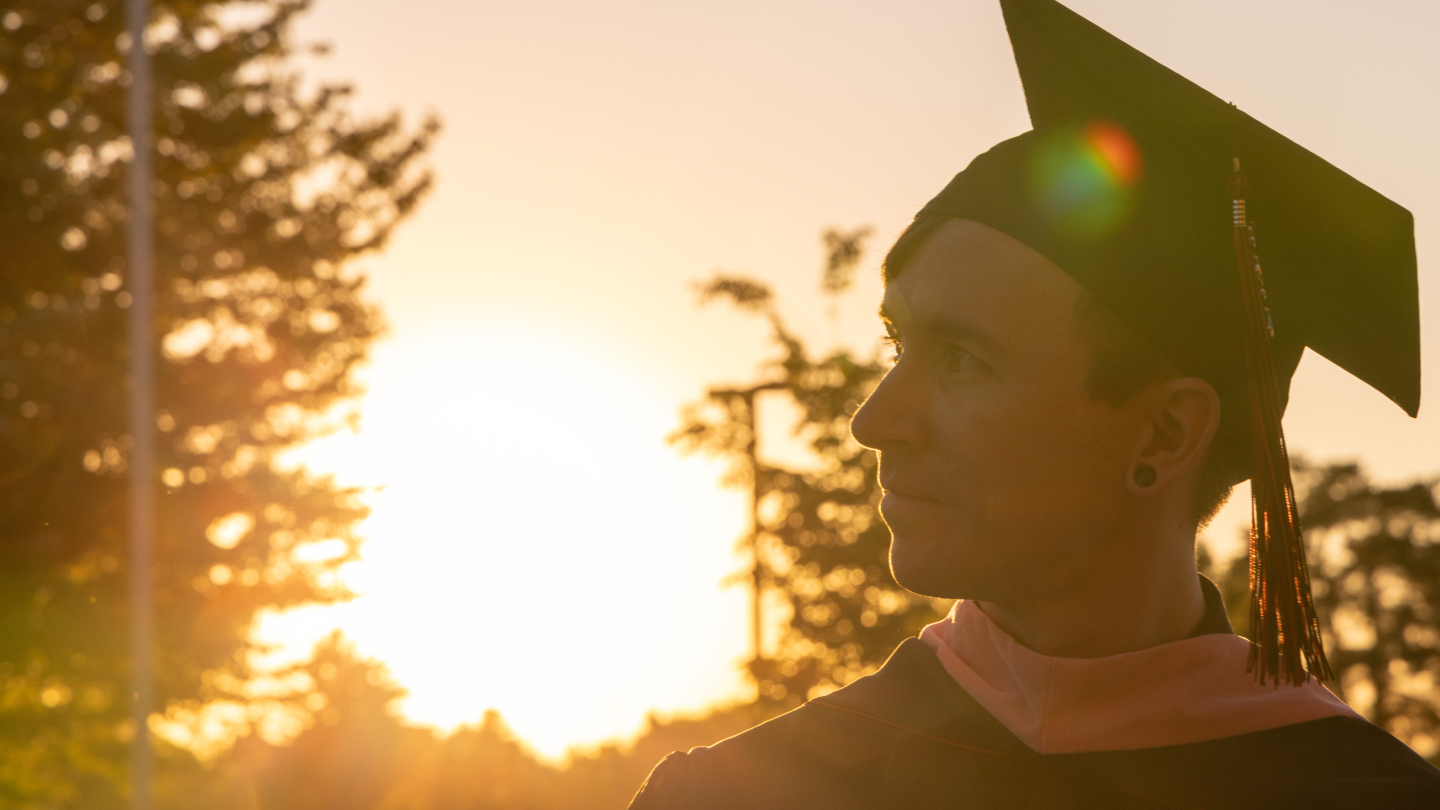Students looking into the sunset.