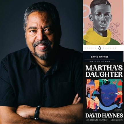 Portrait of David Haynes wearing black, against black background with his arms folded and part of his face obscured as he smiles at the camera. His two book covers are displayed vertically to his left