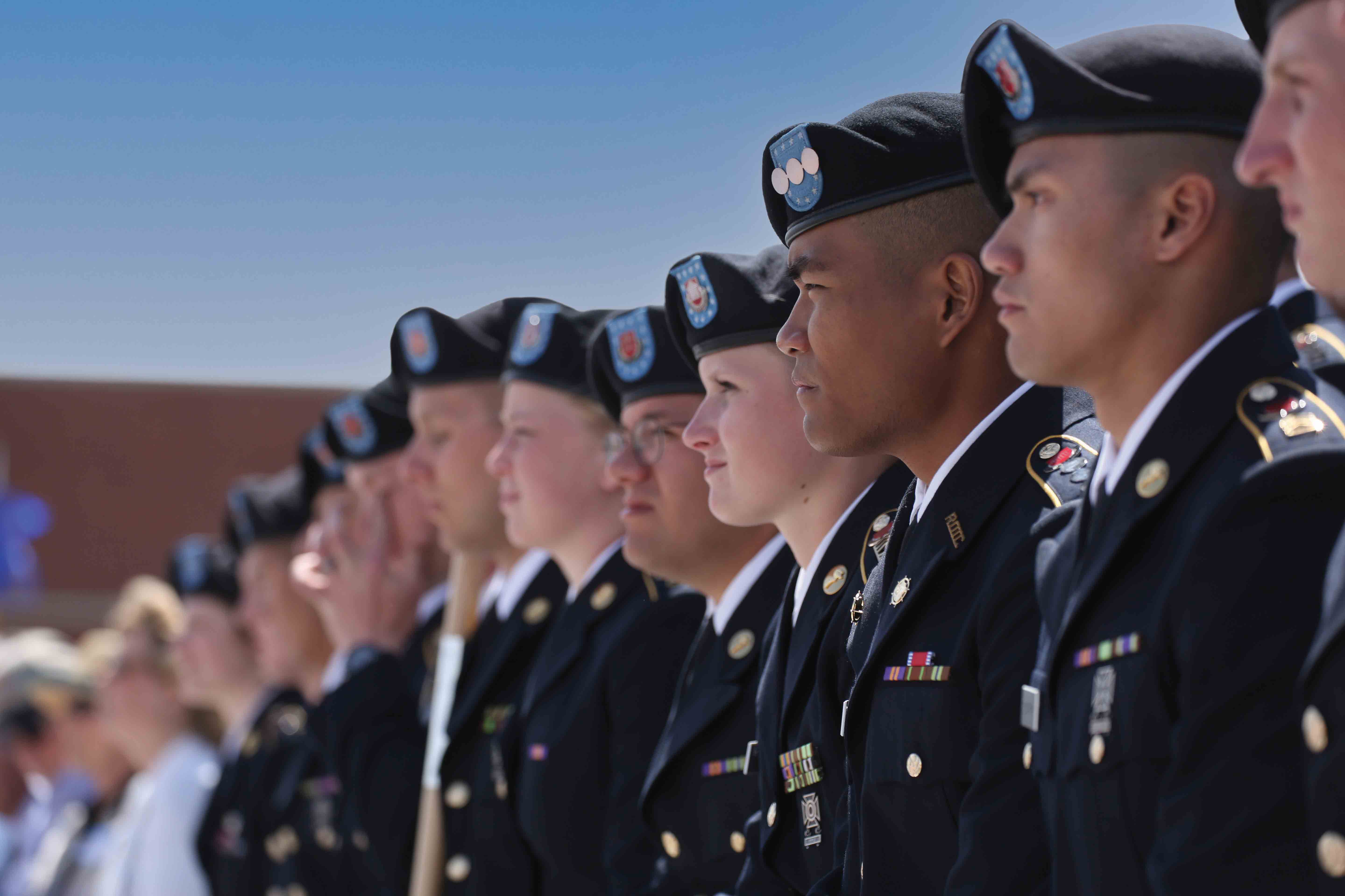 CWU professor pointing at whiteboard to students.