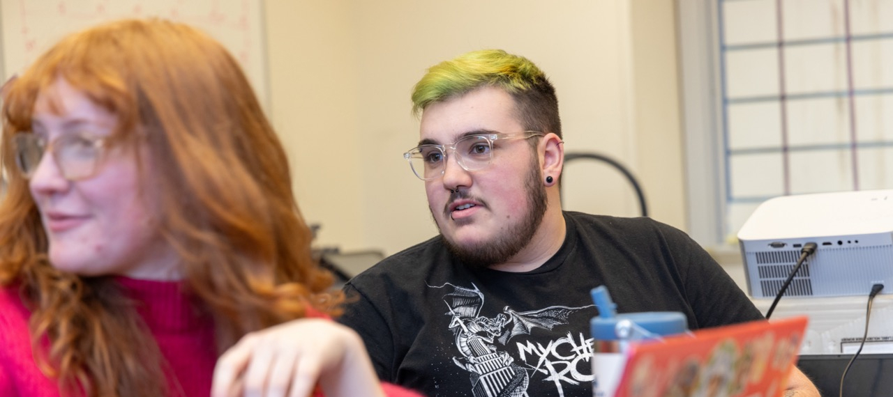 Two students working together on the school newspaper