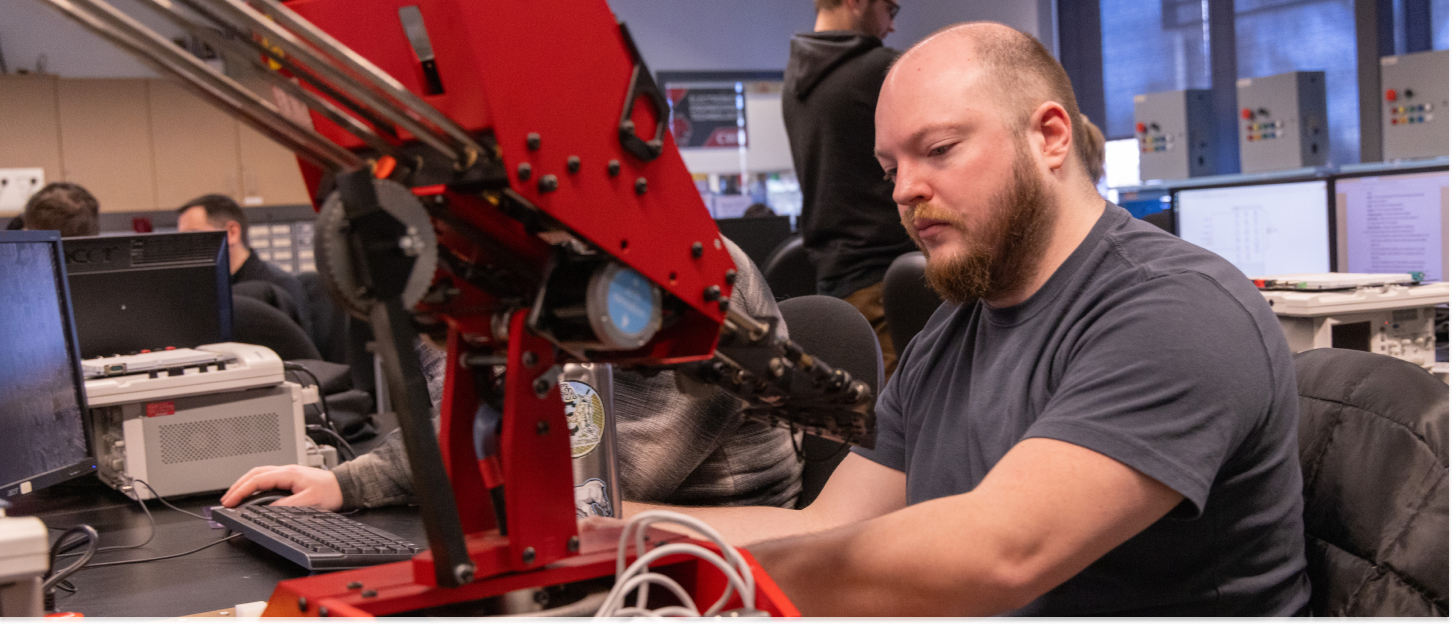 Student working on a robot