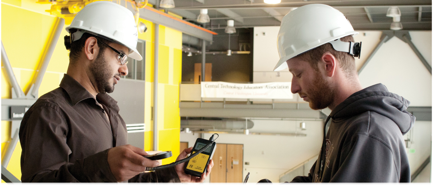 Student and professor working on a safety and health project.