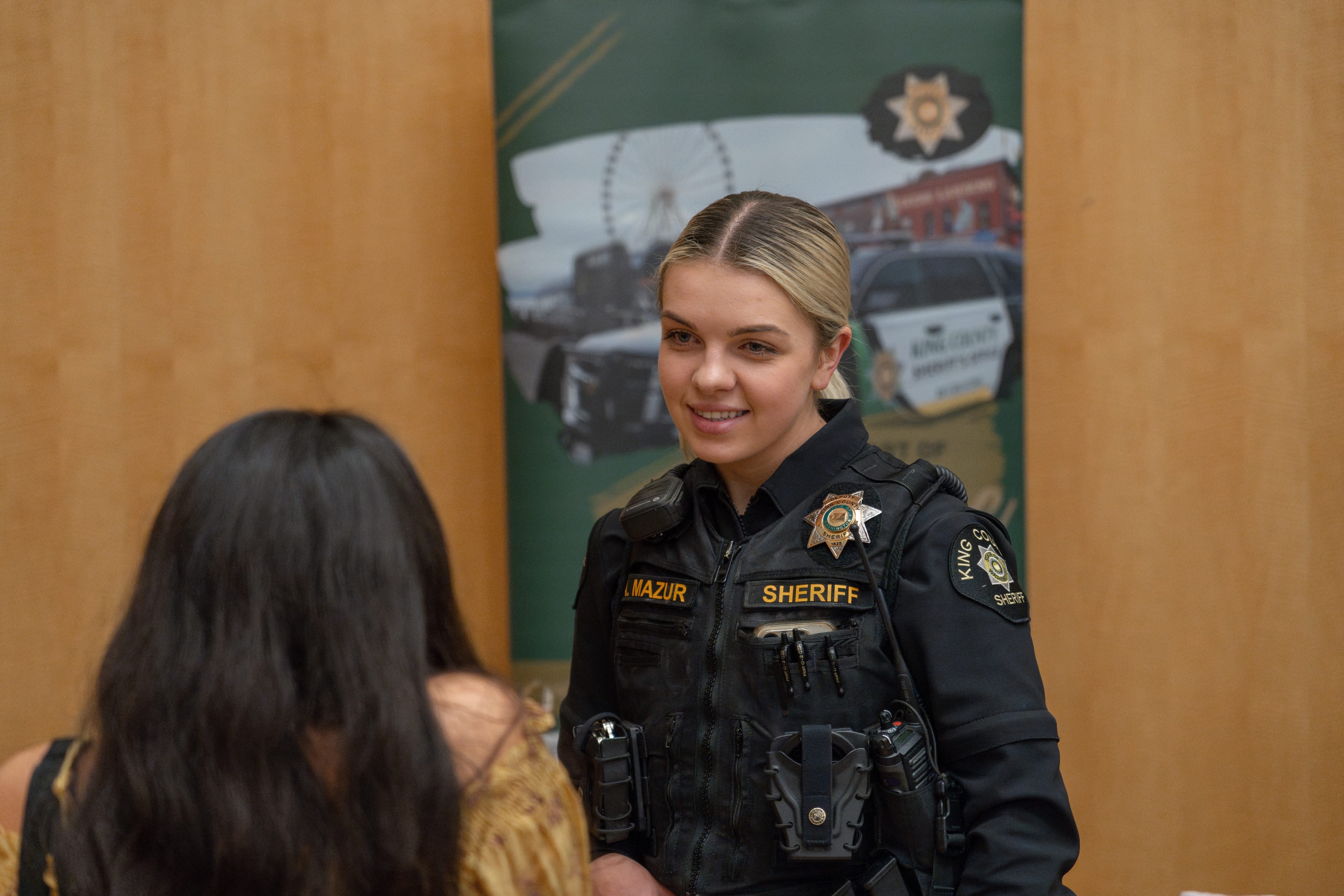 Police officer at a career fair.