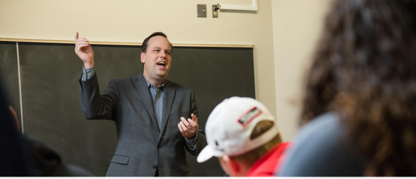 Professor speaking in front of class