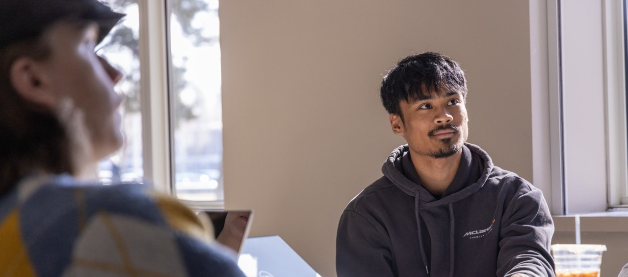 Student listening to a lecture during class. 