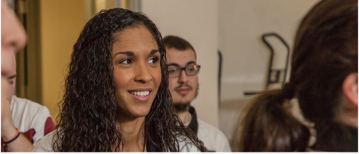 Student looking towards the front of the classroom