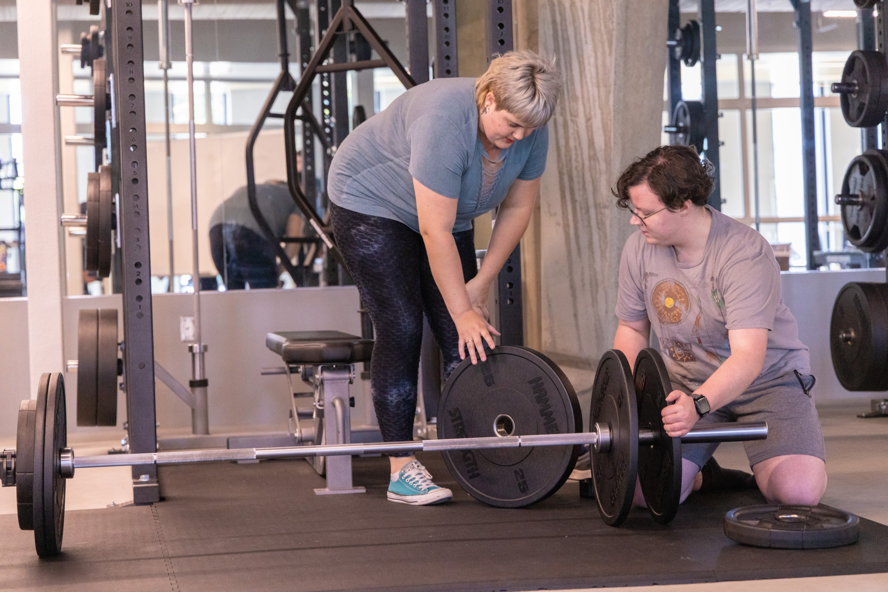 Two students getting ready to lift weights