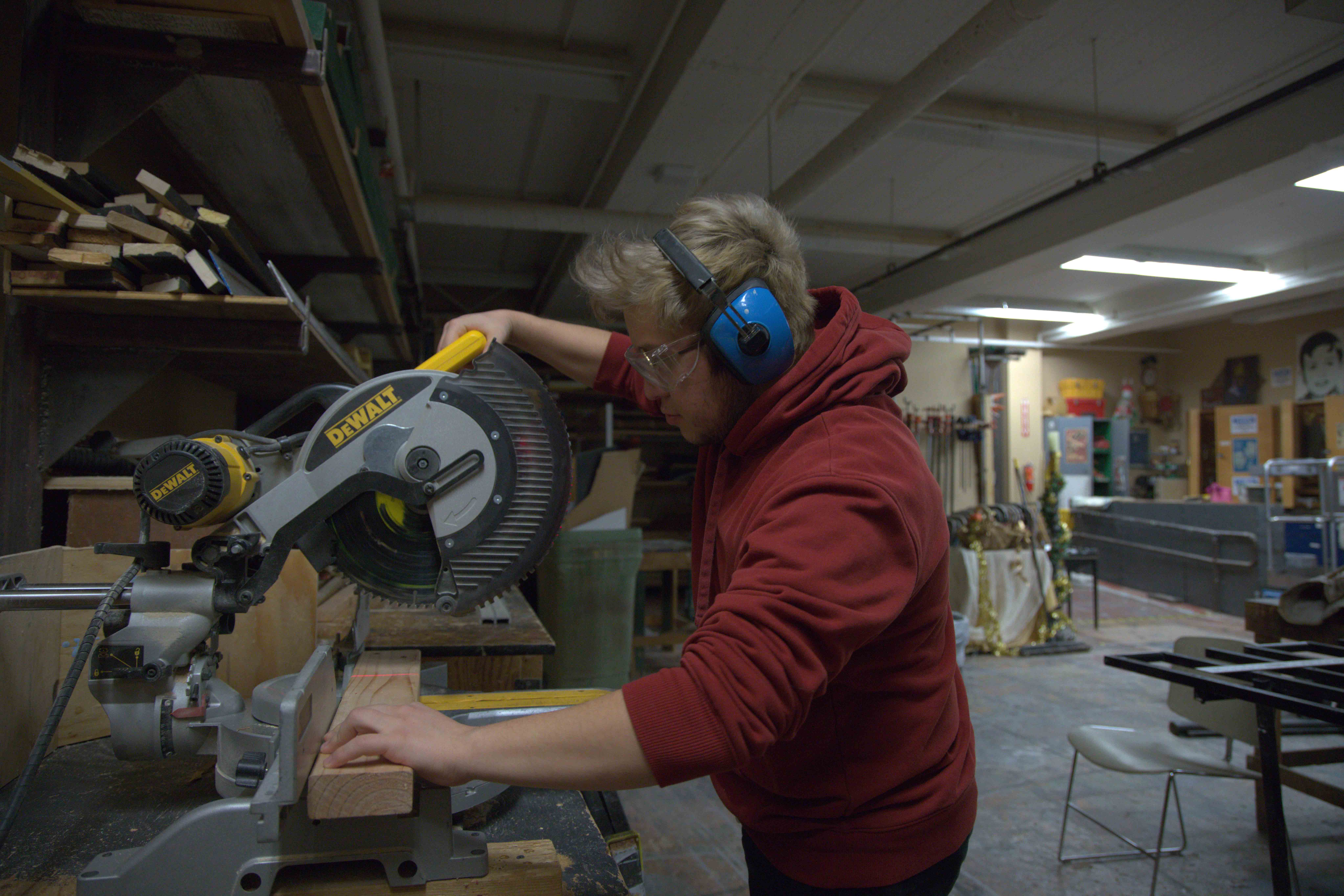 Student working on theatre set design