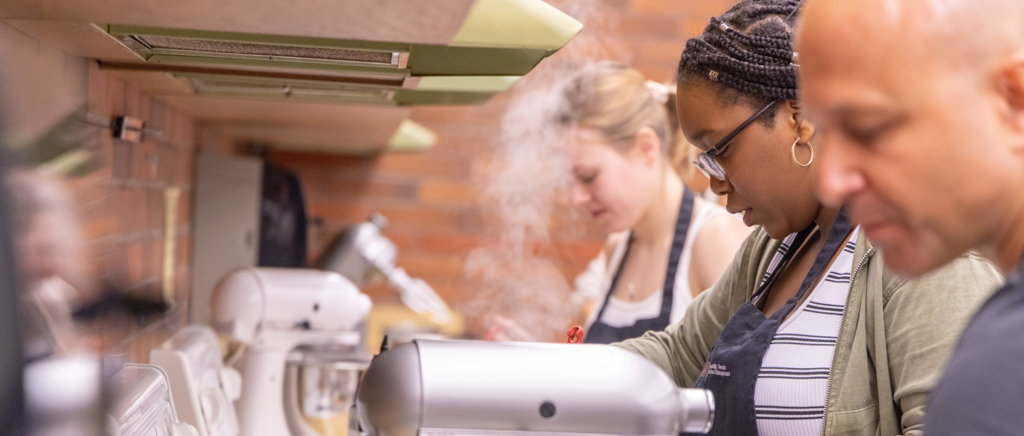 Students making pasta in the classroom