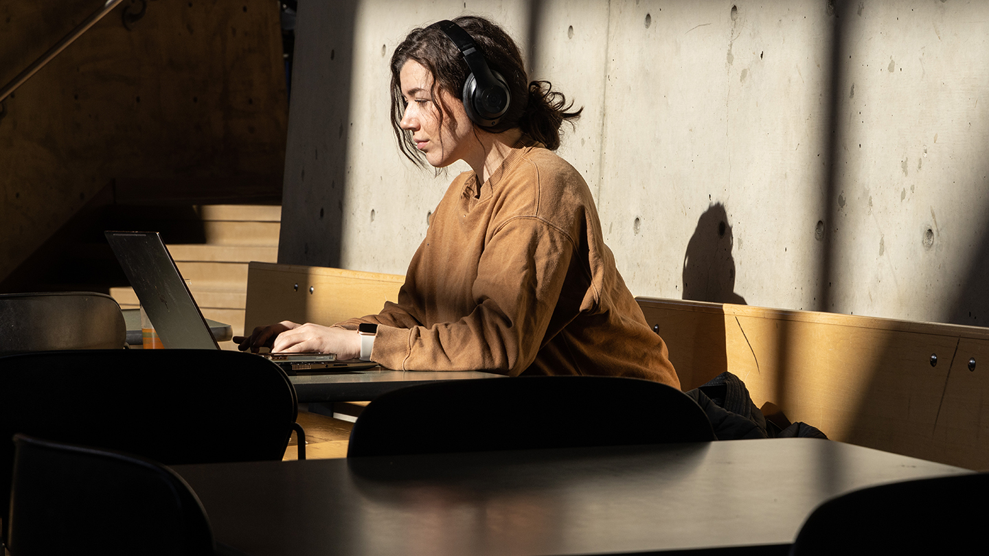 Student doing work on a laptop