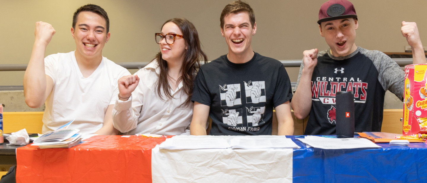 excited french club members cheering 