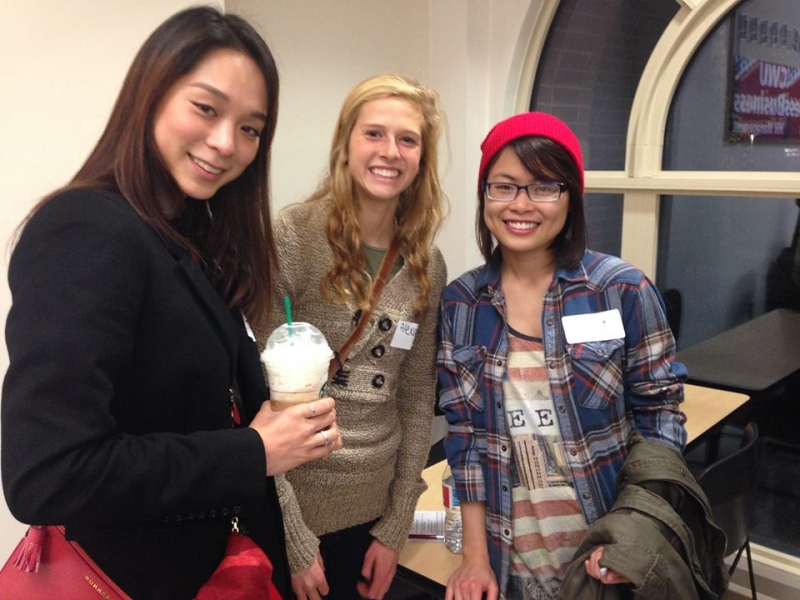3 students smiling at the camera