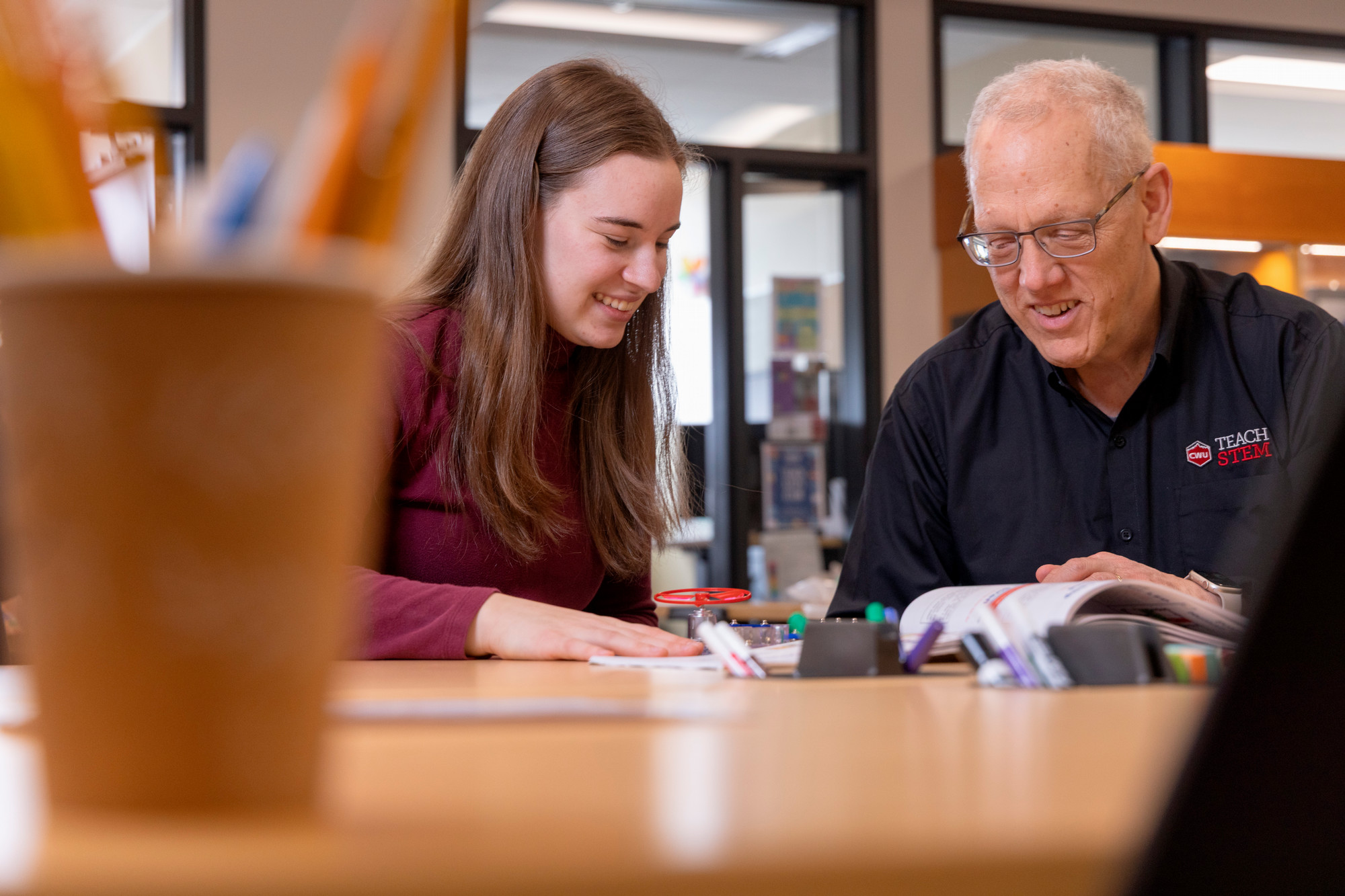 Faculty working with student