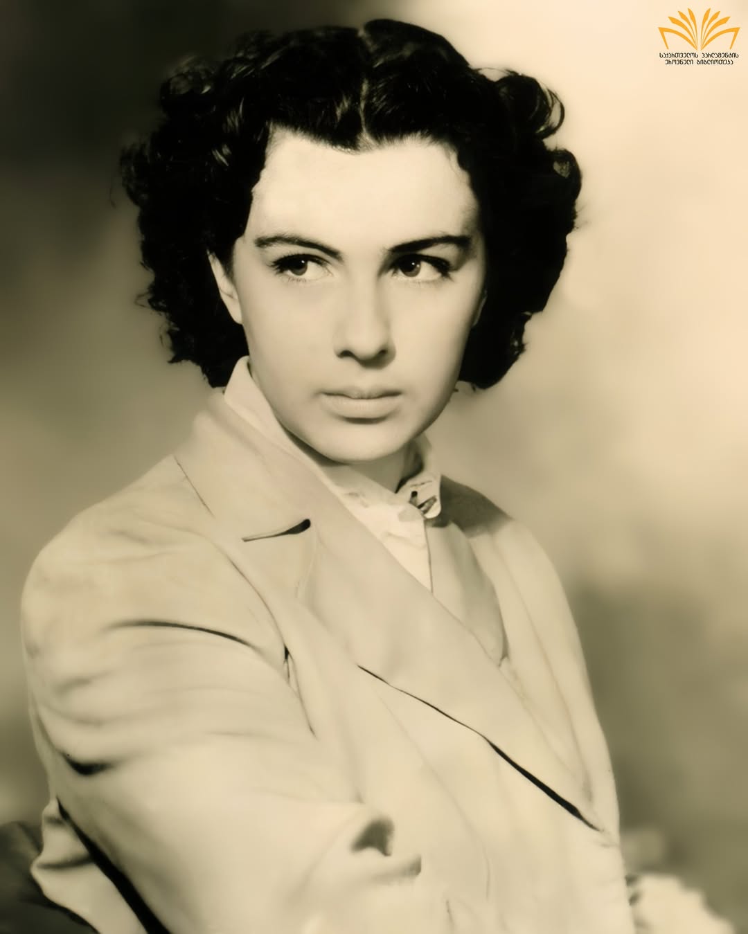 Professional headshot of Dinara