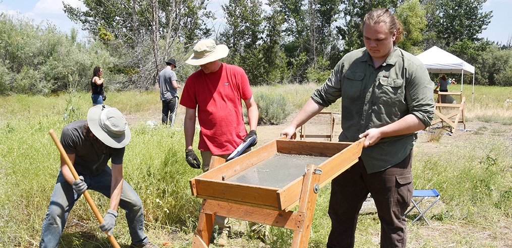 Students dig at Helen McCabe Park in Ellensburg