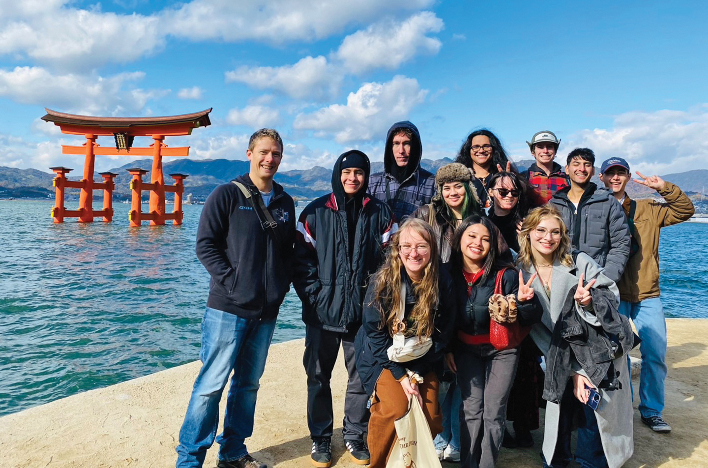 Students take group photo in Japan