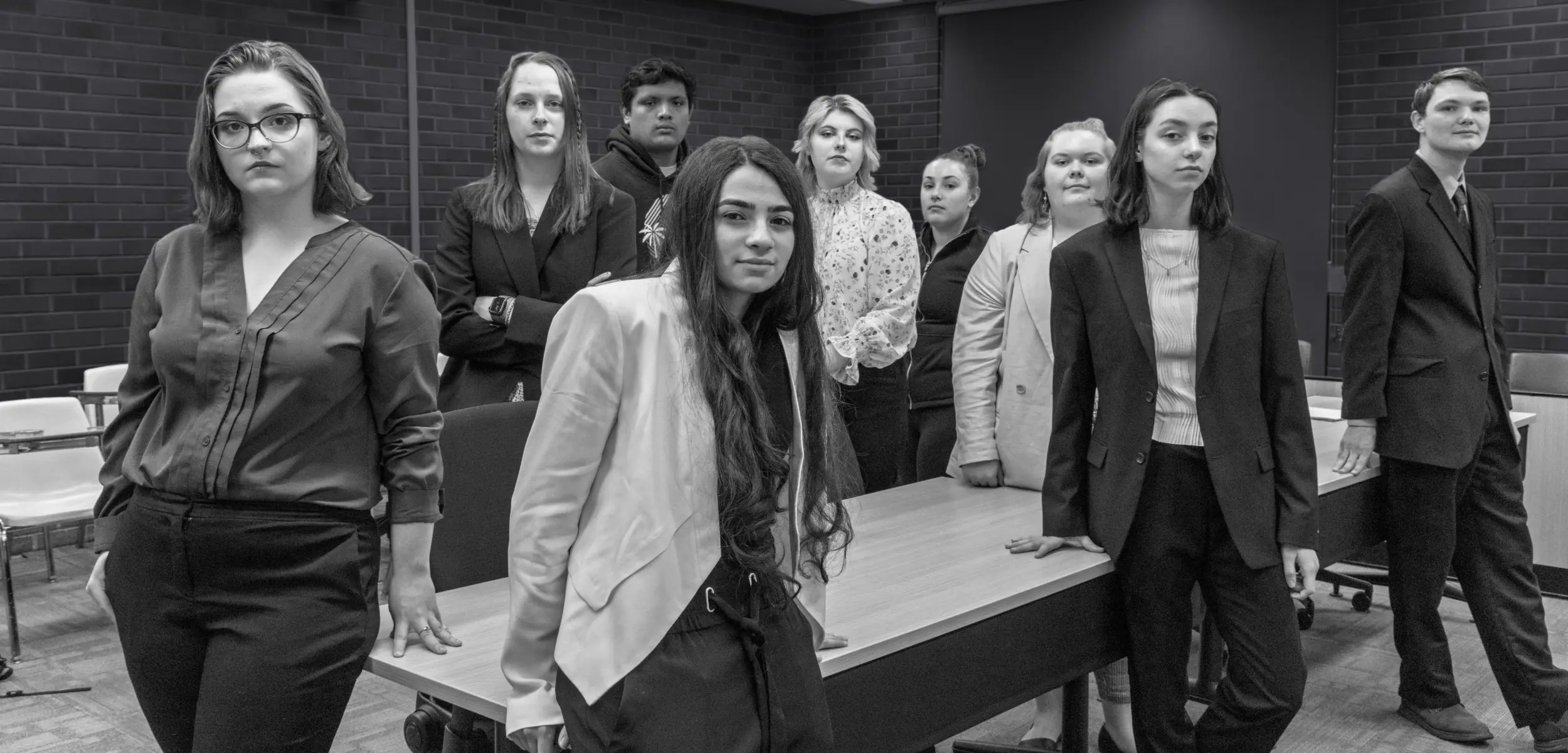 Group of Law and Justice students posing in a classroom.