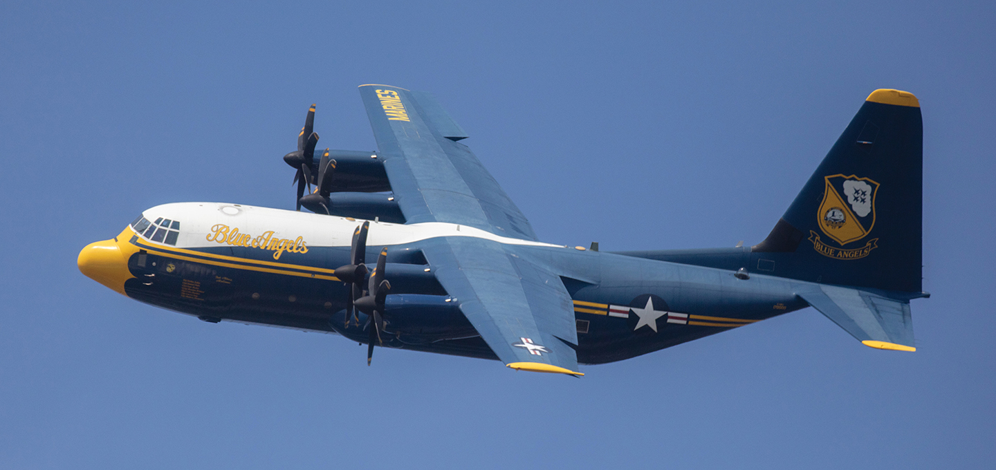 A Blue Angels plane flies above Lake Washington