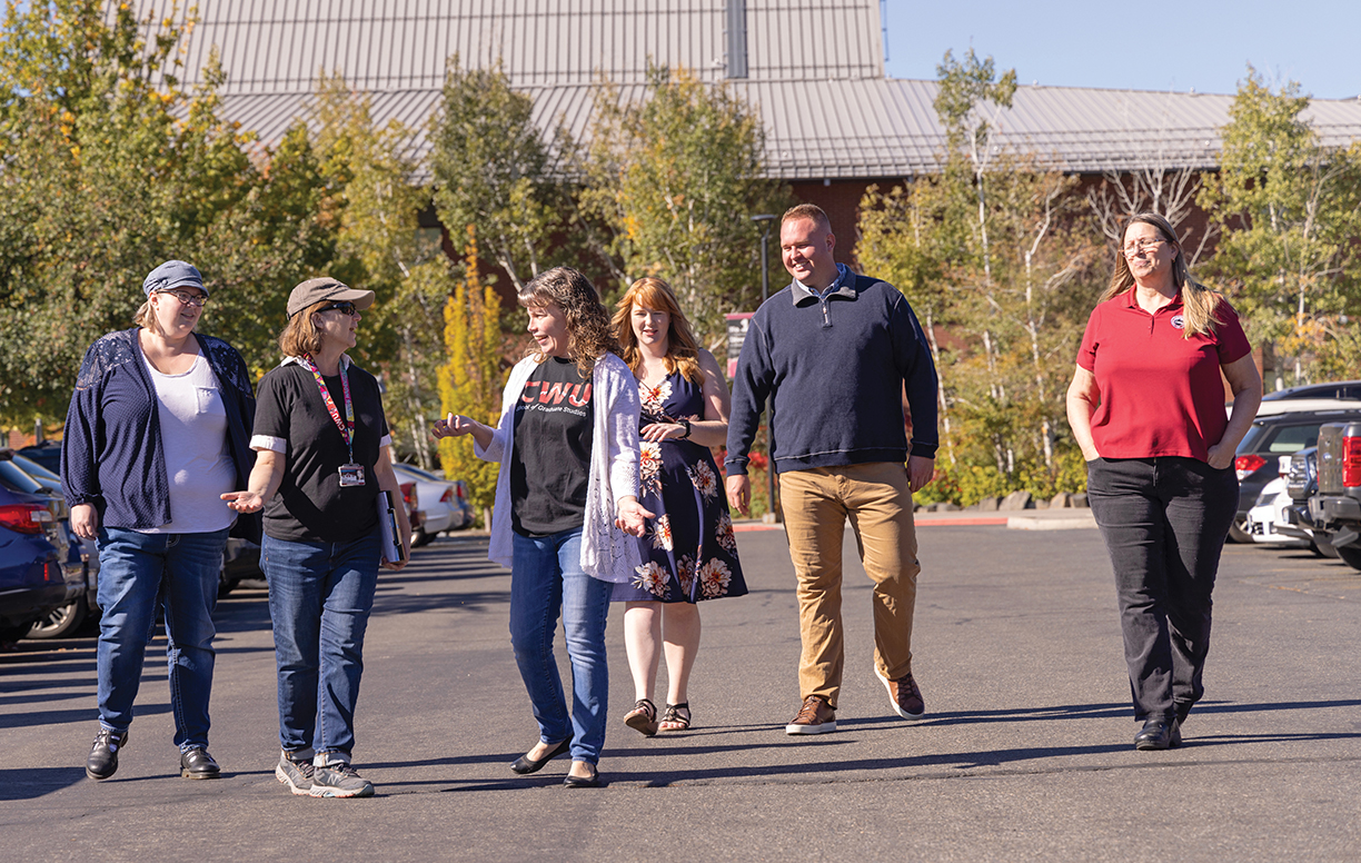 A photo of Elizabeth Fountain's group of students examining a parking lot for solar potential.