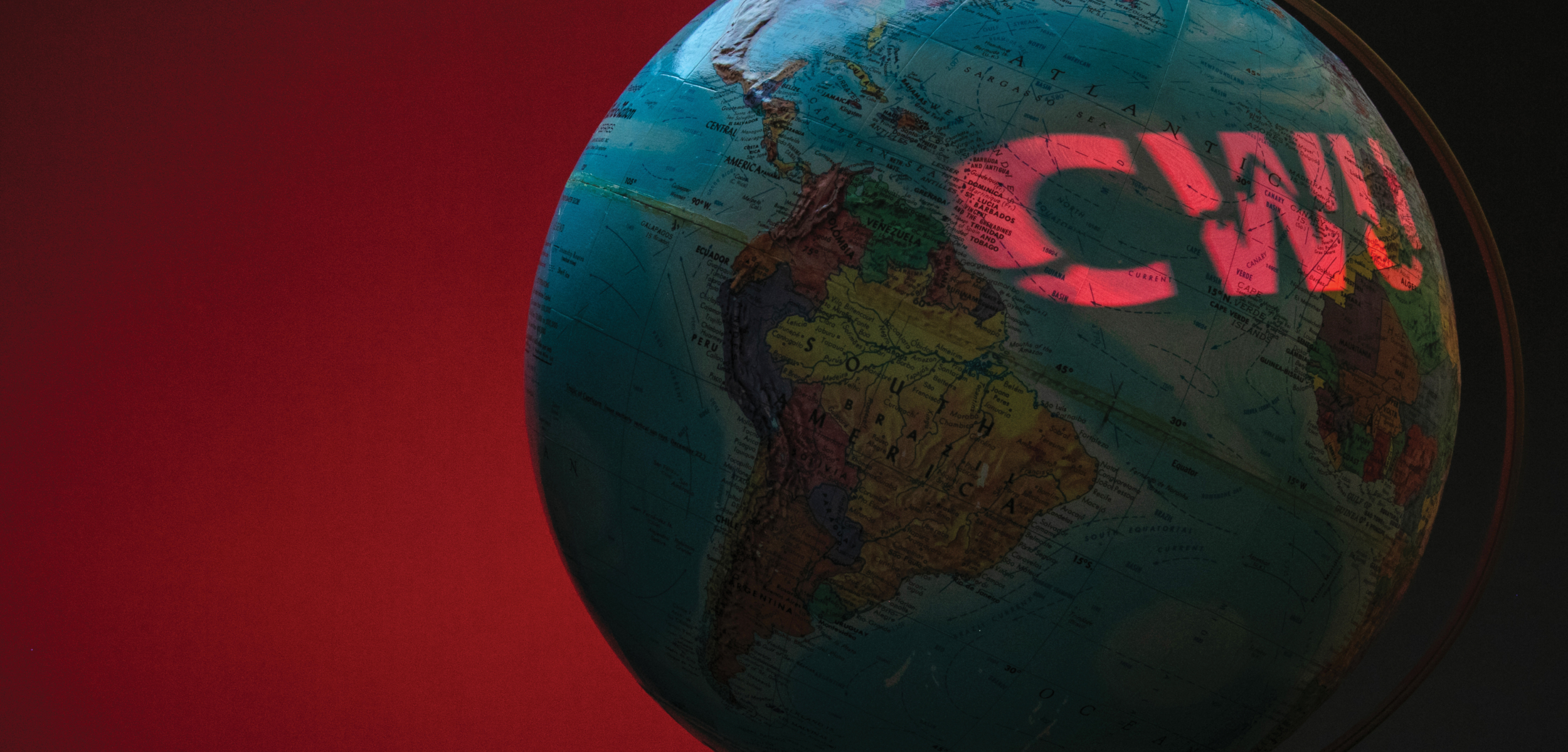 A globe with a CWU logo on it