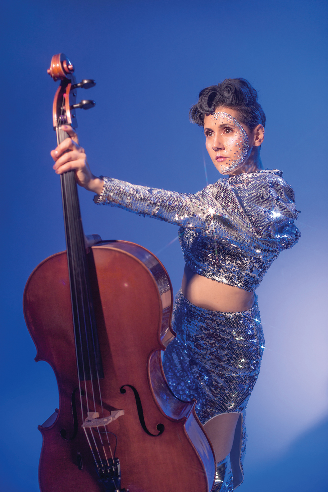 Ashia Grzesik holds her cello