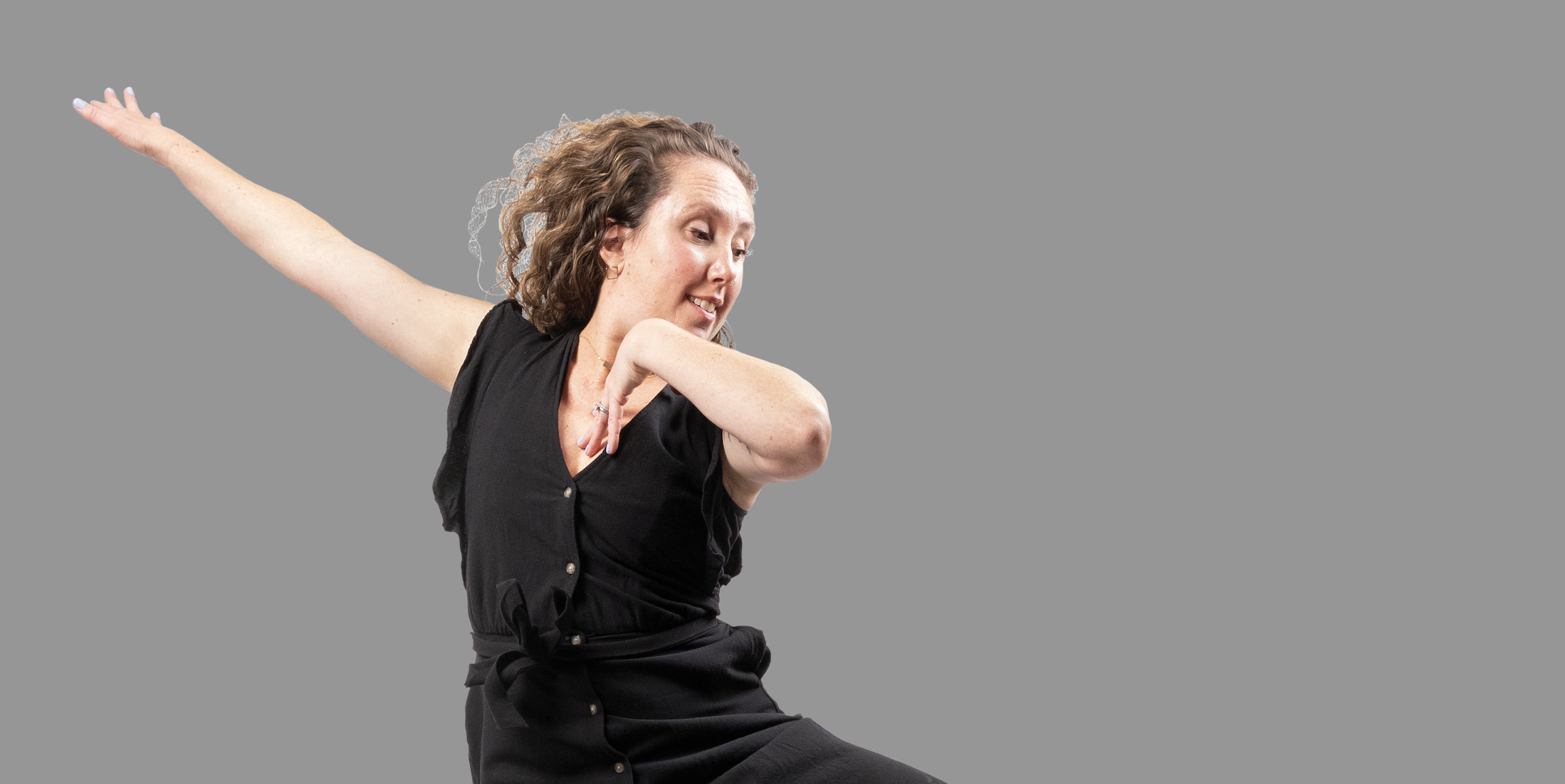 CWU dance professor Gabby McNeillie performs an aerial maneuver