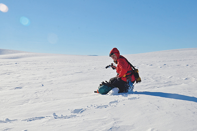 Susan Kaspari conducts research in an ice field in Norway