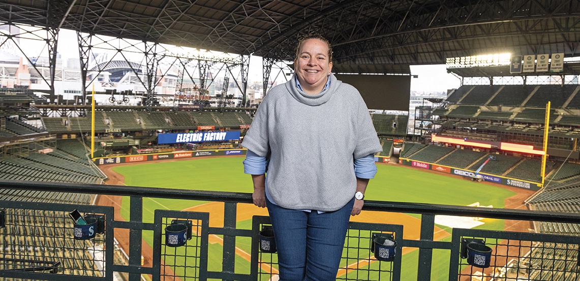 Liz McCloseky stands inside T-Mobile Park.