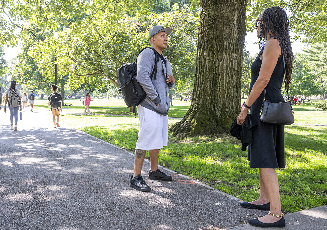 Luis Moreno talks to a professor at Ohio State University
