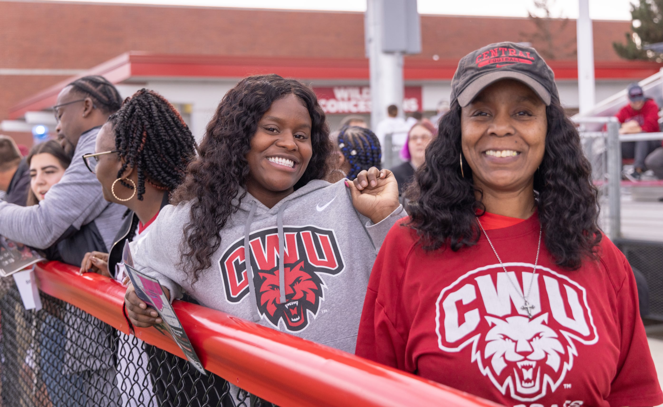 Mom and daughter repping cwu gear