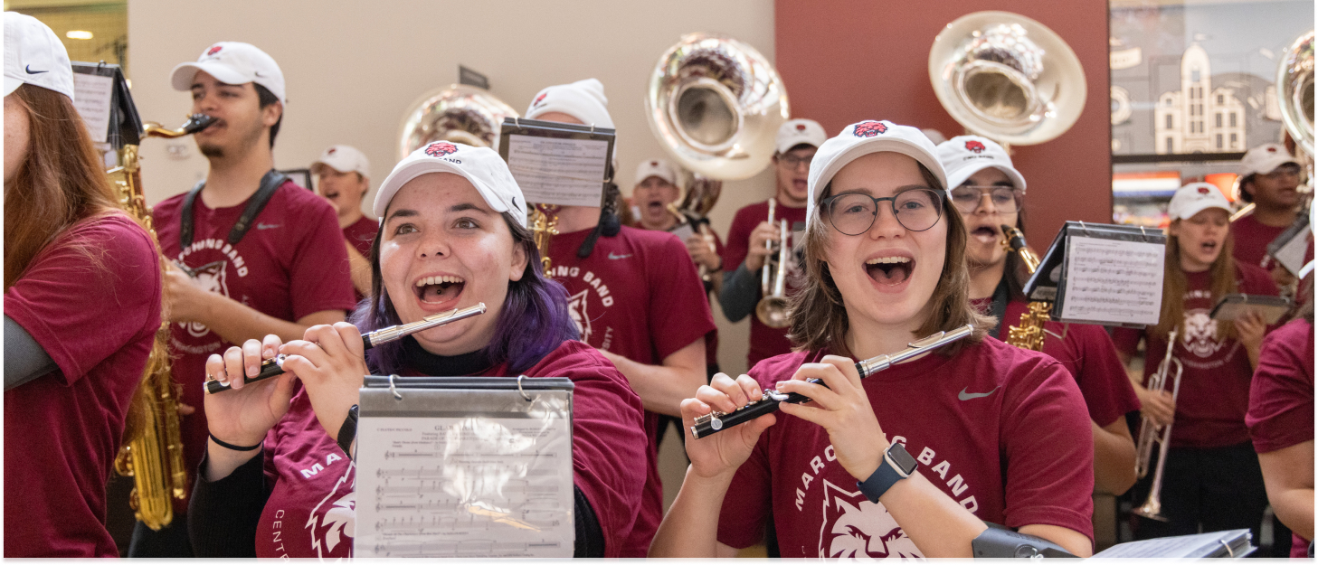 Students playing musical instruments during a rally!