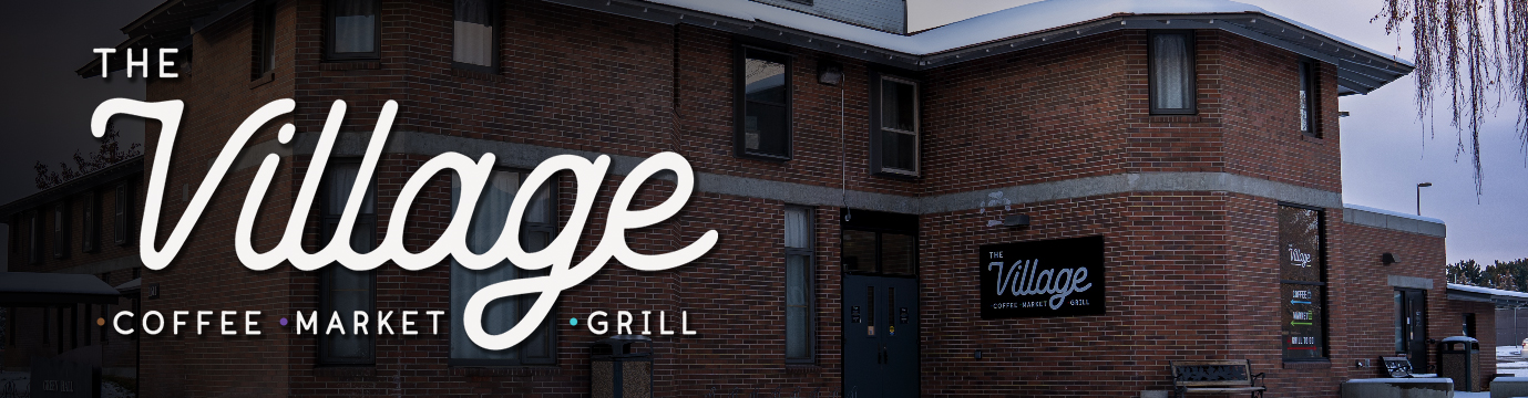 The brick exterior of the Village Cafe, Market, Grill